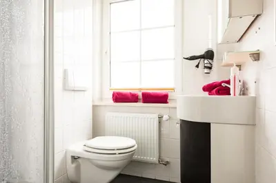 Ein Badezimmer in der Unterkunft Hotel Boddenhus Garni
