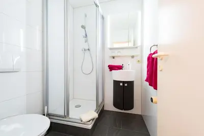 Ein Badezimmer in der Unterkunft Hotel Boddenhus Garni
