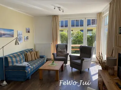 Ein Sitzbereich in der Unterkunft Haus Jui