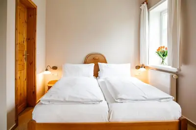 Ein Bett oder Betten in einem Zimmer der Unterkunft Landhaus Morgensünn