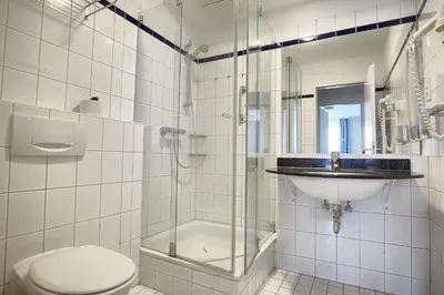 Ein Badezimmer in der Unterkunft Am Kurhaus 211 PP 66