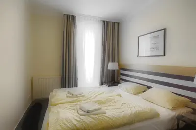 Ein Bett oder Betten in einem Zimmer der Unterkunft Am Kurhaus 318 PP 81
