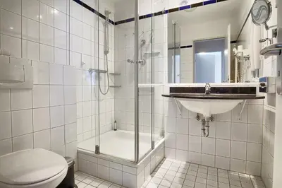 Ein Badezimmer in der Unterkunft Am Kurhaus 318 PP 81