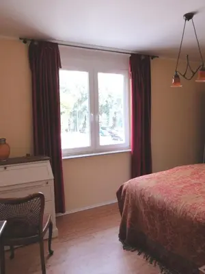 Ein Bett oder Betten in einem Zimmer der Unterkunft Dorothee V6W5