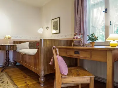 Ein Bett oder Betten in einem Zimmer der Unterkunft altes Kapitänshäuschen