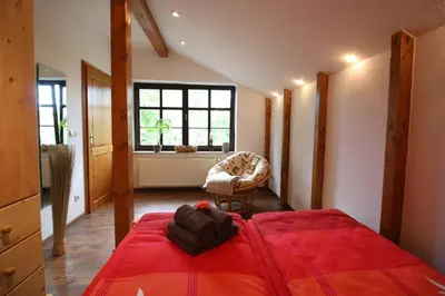 Ein Bett oder Betten in einem Zimmer der Unterkunft Ferienwohnung Baumann