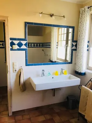 Ein Badezimmer in der Unterkunft 
