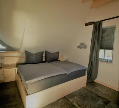 Ein Bett oder Betten in einem Zimmer der Unterkunft 