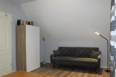 Ein Sitzbereich in der Unterkunft Ferienhaus Kiek Över
