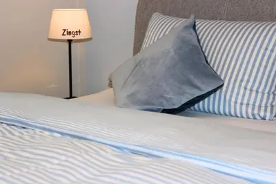 Ein Bett oder Betten in einem Zimmer der Unterkunft Ferienhaus Mee(h)rZeit