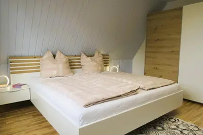 Ein Bett oder Betten in einem Zimmer der Unterkunft Prerower Seekiste