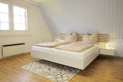 Ein Bett oder Betten in einem Zimmer der Unterkunft Prerower Seekiste