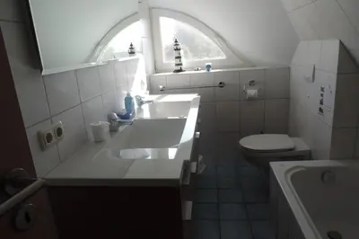 Ein Badezimmer in der Unterkunft 