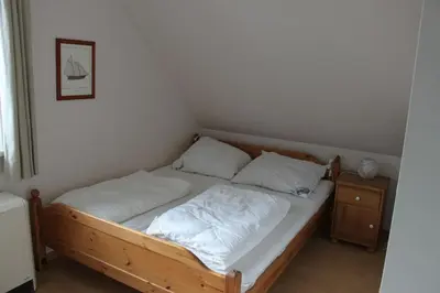 Ein Bett oder Betten in einem Zimmer der Unterkunft 