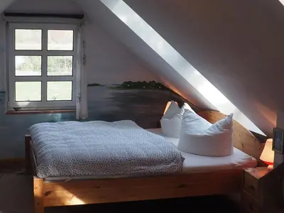 Ein Bett oder Betten in einem Zimmer der Unterkunft kleine Herta