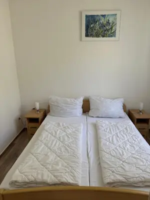 Ein Bett oder Betten in einem Zimmer der Unterkunft -