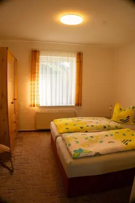 Ein Bett oder Betten in einem Zimmer der Unterkunft Wolf, Barbara, FW 4
