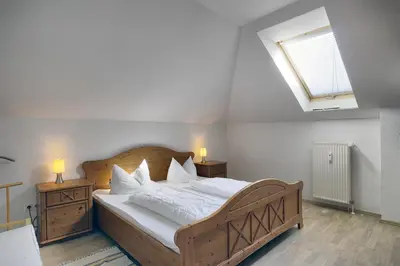 Ein Bett oder Betten in einem Zimmer der Unterkunft Residenz 