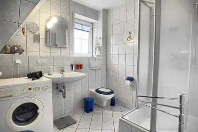 Ein Badezimmer in der Unterkunft Kranich III, Whg 14