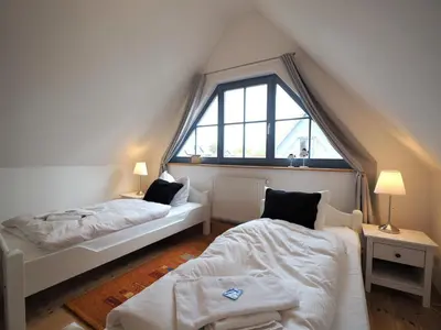 Ein Bett oder Betten in einem Zimmer der Unterkunft Morgensünn