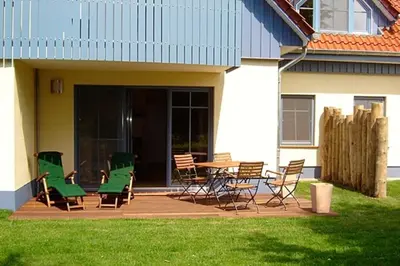 Ein Garten an der Unterkunft Ut kiek, Sprotte