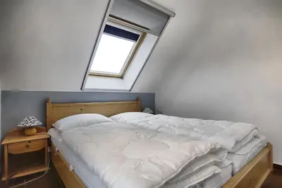 Ein Bett oder Betten in einem Zimmer der Unterkunft Appartmenthaus Central FW 15 