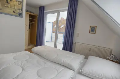 Ein Bett oder Betten in einem Zimmer der Unterkunft Appartmenthaus Central FW 15 