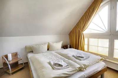 Ein Bett oder Betten in einem Zimmer der Unterkunft Atelier 
