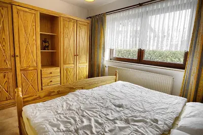 Ein Bett oder Betten in einem Zimmer der Unterkunft Fibian, Hanka
