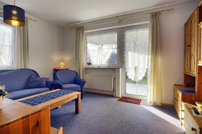 Ein Sitzbereich in der Unterkunft Waldesruh - FW