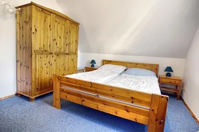 Ein Bett oder Betten in einem Zimmer der Unterkunft Waldesruh - App2