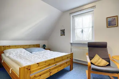 Ein Bett oder Betten in einem Zimmer der Unterkunft Waldesruh - App2