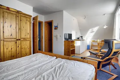 Ein Bett oder Betten in einem Zimmer der Unterkunft Waldesruh - App 1
