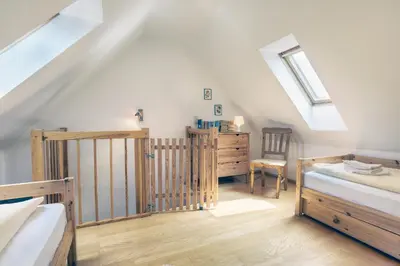 Ein Bett oder Betten in einem Zimmer der Unterkunft Küstentied