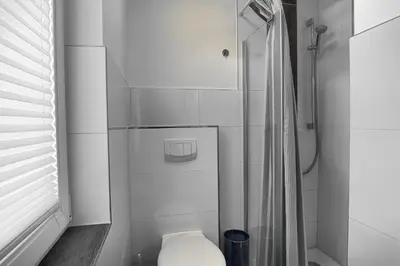Ein Badezimmer in der Unterkunft Küstentied
