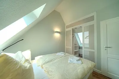 Ein Bett oder Betten in einem Zimmer der Unterkunft MeerZeit