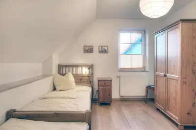 Ein Bett oder Betten in einem Zimmer der Unterkunft Edda