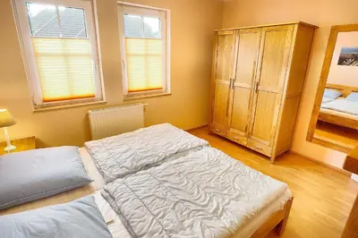 Ein Bett oder Betten in einem Zimmer der Unterkunft Gerlach