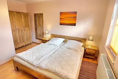Ein Bett oder Betten in einem Zimmer der Unterkunft Gerlach
