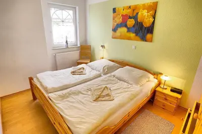 Ein Bett oder Betten in einem Zimmer der Unterkunft Hampel, Fewo Vogelsang-Whg 1