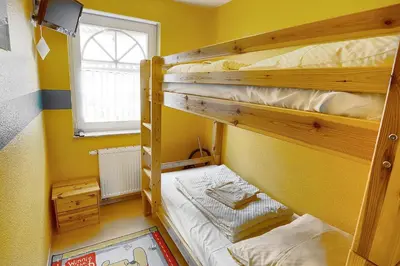 Ein Bett oder Betten in einem Zimmer der Unterkunft Hampel, Fewo Vogelsang-Whg 1