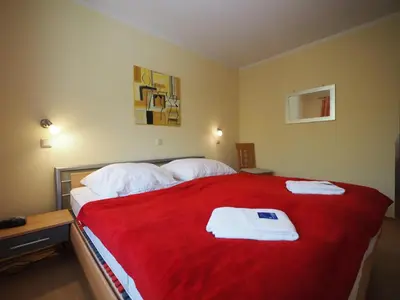 Ein Bett oder Betten in einem Zimmer der Unterkunft Hoppenberg