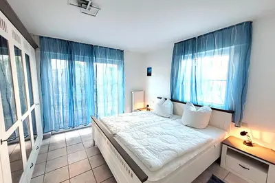 Ein Bett oder Betten in einem Zimmer der Unterkunft Am Strand 2, PP innen