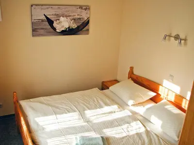 Ein Bett oder Betten in einem Zimmer der Unterkunft Ihrgistern, FW 1