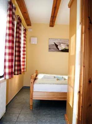 Ein Bett oder Betten in einem Zimmer der Unterkunft Ihrgistern, FW 1