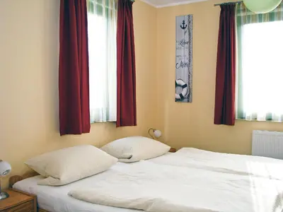 Ein Bett oder Betten in einem Zimmer der Unterkunft Hütigendachs, FW 4