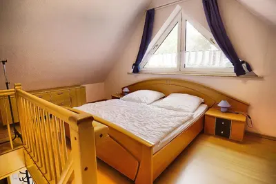 Ein Bett oder Betten in einem Zimmer der Unterkunft Hirschberger, Christian, FW 2