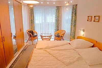 Ein Bett oder Betten in einem Zimmer der Unterkunft Kranich VIII, Whg 37
