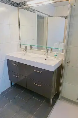 Ein Badezimmer in der Unterkunft Kranich VIII, Whg 37