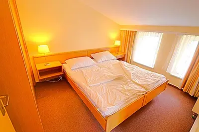 Ein Bett oder Betten in einem Zimmer der Unterkunft St Michael, FW 1PP am Haus